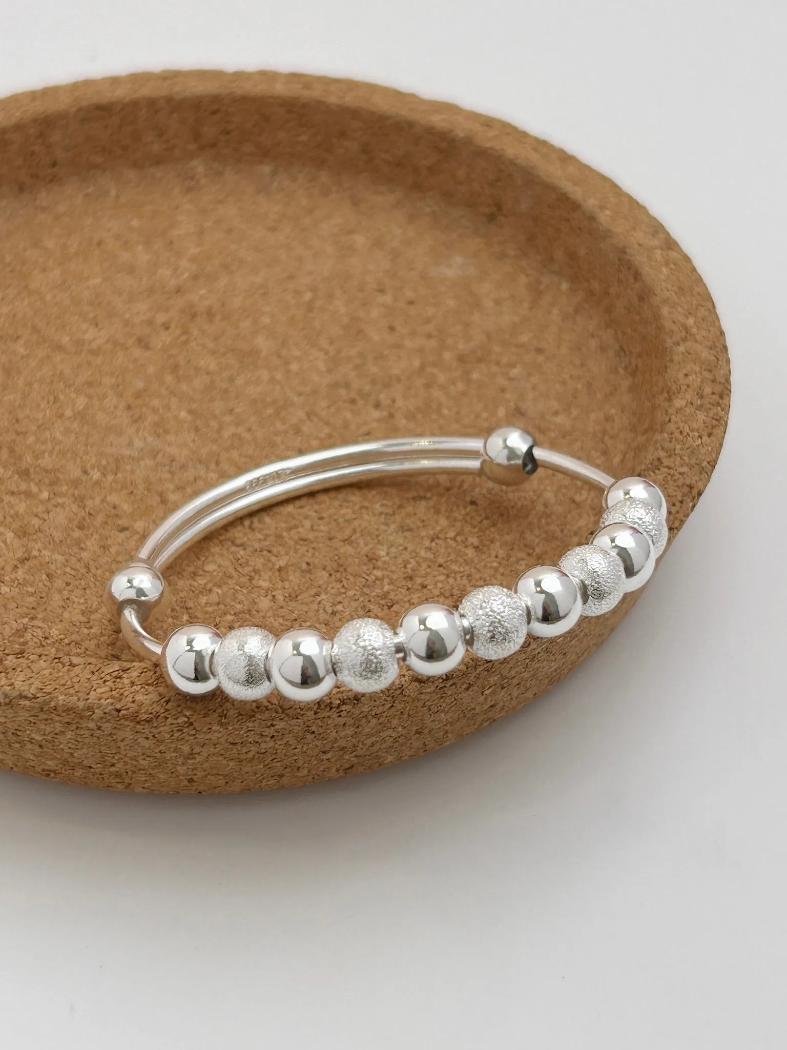 S990 Adjustable Shiny Rolling Beads Baby Bangle